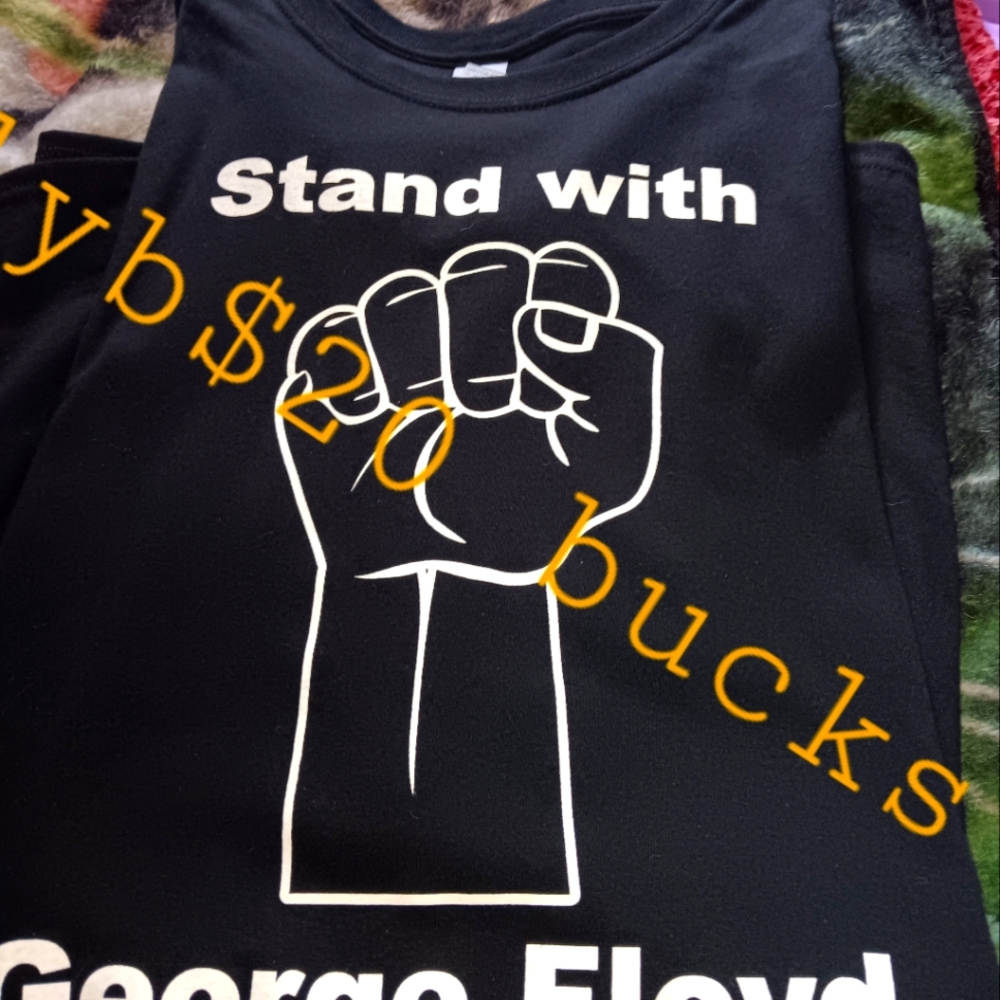 Stand with queen shirts.